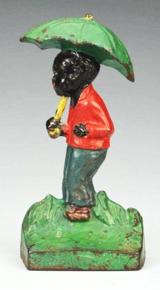 Cast Iron Little Black Sambo Doorstop.: "Blodgett Studios, Lake Geneva, Wisconsin, Copyright". Rare and desirable. Condition (Excellent). Size 8 - 1/2" T.
