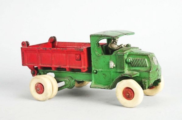 Cast Iron Hubley Large Mack Dump Truck.: Replaced tires and figure. Condition (Excellent). Size 10 - 1/2" L.