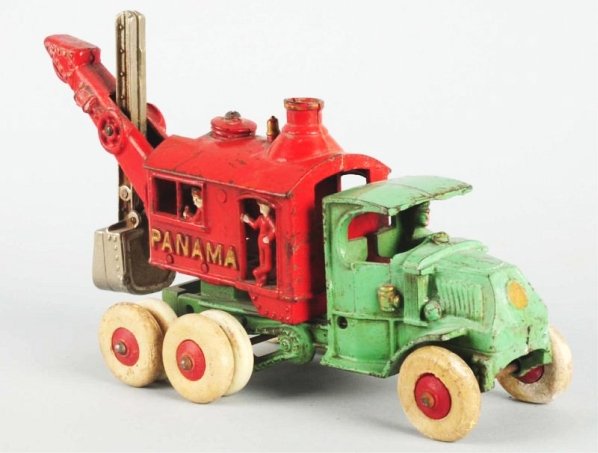 Cast Iron Large Hubley Mack Panama Truck.: Has white residue from cleaning and four replaced tires. Condition (Very Good - Excellent). Size 13" L.