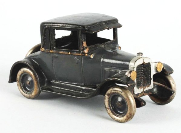 Cast Iron Arcade Black & Gre Chevrolet Coupe.: Original spare would clean nicely. Condition (Very Good - Excellent). Size 8" L.