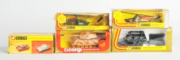 Lot of 5: Die Cast Corgi Military Vehicles.: A No.904 German King Tiger tank, No.906 Salidin armored car, a No.920 Bell AH-1G helicopter a No.907 German rocket launcher and a No.923 Sikorsky helicopter. Some tape to boxes. Also some creasing and
