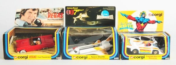 Lot of 3: Die Cast Corgi TV & Movie Vehicles.: No.649 Spaceshuttle from James Bond "Moonraker", Vegas $ Ford Thunderbird and a Captain Marvel Porsche No.262. Some creasing to cards and plastic. Plastic missing off of Vegas Thunderbird. Condition (