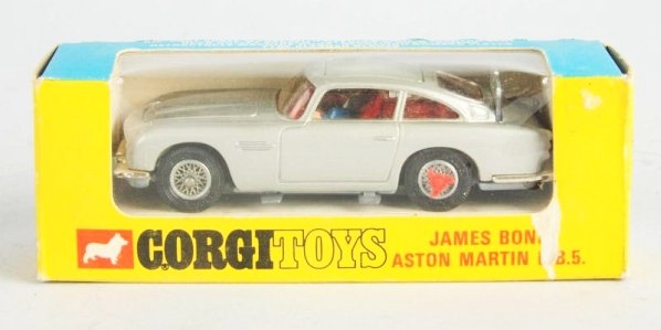Corgi Die Cast No.270 James Bond Aston Martin.: D.B.5 Automobile. In window box. Has some paper loss on bottom right corner where the D in bond is and the D in D.B.5 is. Edge wear to box. Condition (Very Good - Excellent). Size 5 - 1/4" L.