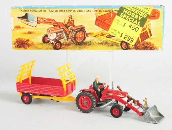 Die Cast Corgi No.9 Gift Set.: Original box it is a Massey Ferguson Tractor with shovel, driver, and tipping trailer. Does have an original price tag stuck to the front. Some slight paper loss and wear to one end flap and corners.