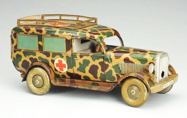 German Hauser Tin Litho Wind-up Ambulance Toy.: Includes original driver and passenger in front. Marked "WH-914" on the front and back. Has original ambulance doors which open in rear. Has seldom seen strechers and wounded soldier figures. Minor to