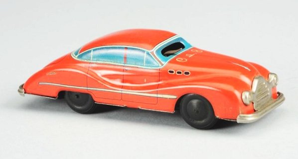 Arnold Tin Wind-up Car.: Made in Germany. Car is all original. Condition (Very Good). Size 5 - 1/4" L.