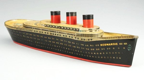 Lot of 2: German Toys.: First is a tin litho biscuit tin of the ocean liner Normandie. Piece has very slight wear. Second is a German Neuse Auto Pennen Racing Game. Appears to be complete in original box. Condition (Very Goo