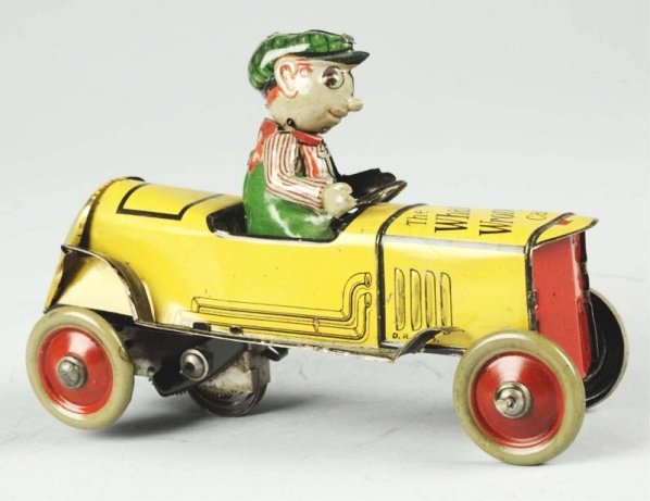 Distler Tin Wind-up "Whats Wrong Car".: Car has a replacement front grill. Significant play wear. Figure is original. Condition (Good). Size 7 - 1/2" L.