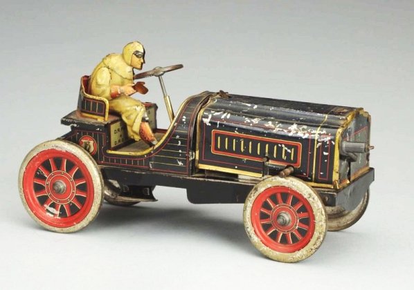 German Tin Litho Hess Mobile Toy.: Includes one original lithograph driver. Has an unusual front crank mechanism. Solid disc tin litho wheels. Does have some scratching and litho loss throughout. Condition (Very Good). Size 8" L.