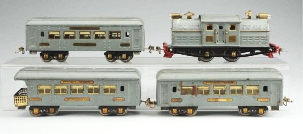 Ives O Gauge 4 Piece Gray Train Set.: Include engine No. 3257R, also two parlor cars No.141 an observation car No.142. Sets all original. Some chipping and scratching. Condition (Very Good).