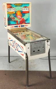 William's Pretty Baby Pinball Machine with Keys.: (1965). Easy to medium difficulty to acquire. Backglass has some fading and spots of missing paint. Two player game. Has reel scoring. All plastics are correct on playfield. Slightly worn but good