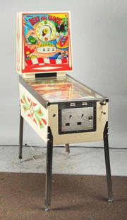 William's Beat the Clock Pinball Machine (1963).: Medium difficulty to acquire. Reverse wedge head back box game based on time and reel scoring. Highest obtainable score: 1999. Backglass has a few small spots of peeling paint. Playfield all bumper