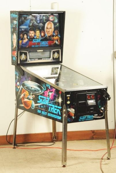 Williams Star Trek: The Next Generation Machine.: (1993). Easy to locate, complex "rule set", with a very open playfield. If you don't watch Star Trek this game will seem like Chinese to understand. It's got lots of action and is fast moving, is a bi