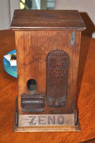Zeno Chewing Gum Counter-top Dispensing Machine.: Wood and metal machine in nice original condition. Metal is a little rusty. Working. Condition (7.5). Size 16" x 9" x 10"