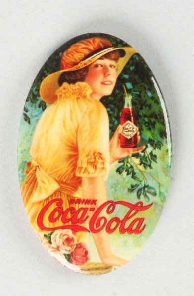 1916 Coca-Cola Pocket Mirror.: Strong vibrant colors with a bumpy surface and little to no wear. Condition (Near Mint). Size 2 - 3/4" T.