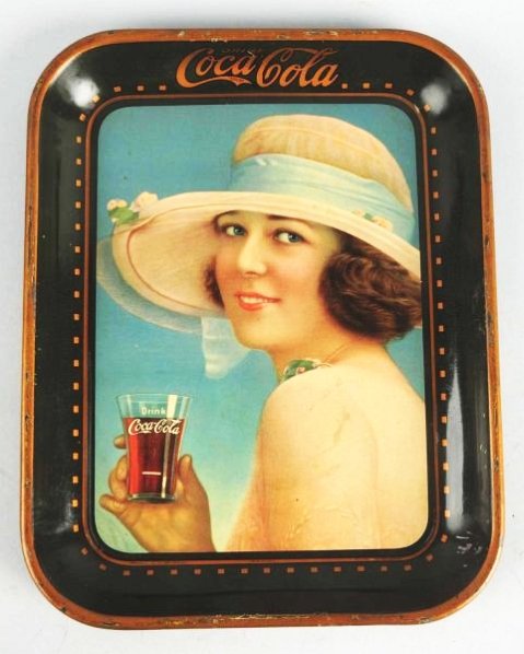 1922 Coca-Cola Serving Tray.: Surface is textured with multiple uniform tiny dot pattern and with rim nicks and small marks. Condition (Very Good). Size 13 - 1/4" x 10 - 1/2".