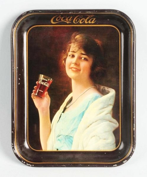 1923 Coca-Cola Serving Tray.: Small surface marks, with more on border and rim, gloss differences. Condition (Very Good). Size 13 - 1/4" x 10 - 1/2".