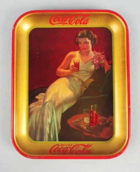 1937 Coca-Cola Serving Tray.: Yes, dated 1937 and Coca-Cola Canada. Small rim nicks and a tiny shallow dent with little wear. Condition (Near Mint). Size 13 - 1/4" x 10 - 1/2".