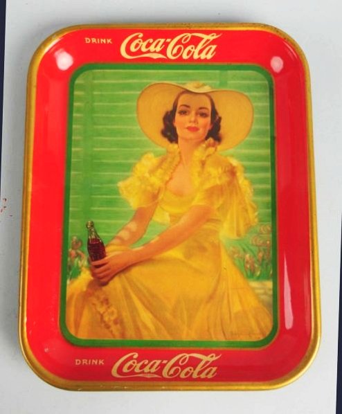 1938 Coca-Cola Serving Tray.: A few very small dents and marks with clean rim and great color! Condition (Excellent Plus). Size 13 - 1/4" x 10 - 1/2".