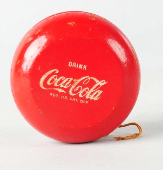 1950s Coca-Cola Duncan Yo-Yo.: Light paint chipping and surface marks from use. Condition (Excellent). Size 2 - 1/2" Dia.