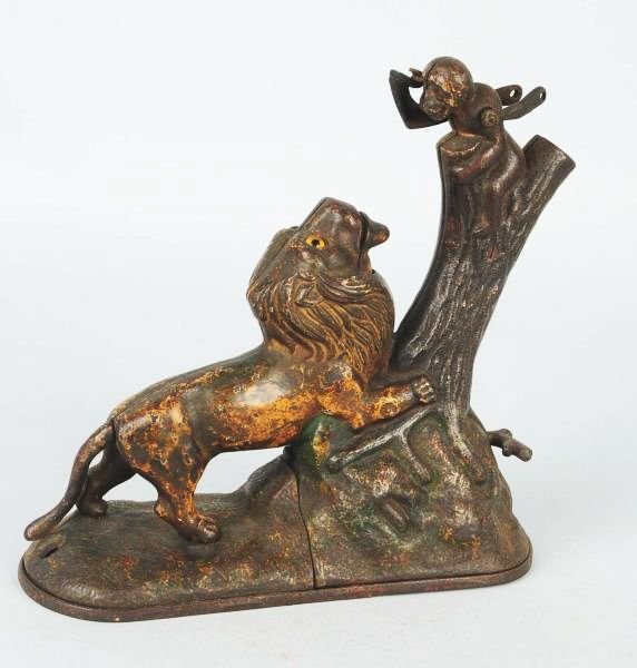Cast Iron Lion & 2 Monkeys Mechanical Bank.: Manufactured by Kyser and Rex. Bank is missing small monkey. Condition (Good). Size 8 - 3/4" L.
