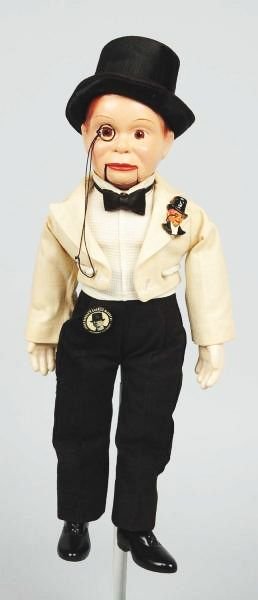 Charlie McCarthy Doll in Evening Wear.: Excellent condition. No cracks has original Effanbee. Clean and crisp. Has original die cut pin also. Circa 1930s. Size 16" T.