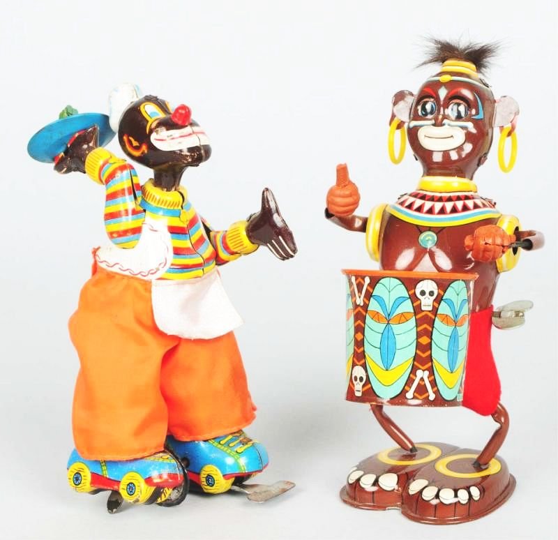 Lot of 2: Japanese Tin Litho Wind-up Black Toys.: Includes a TPS skating chef and a drumming native. Drumming native has the rubber tom tom sticks broken off and missing. Skater looks to have replaced pants. Some scratching and wear. Condition (Good 