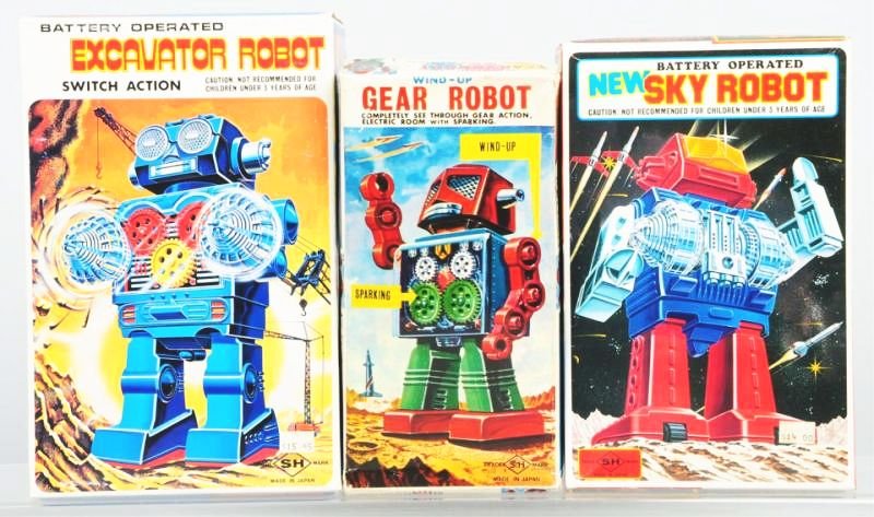 Lot of 3: Vintage Japanese Robots.: Includes two battery operated robots and one wind-up robot. All have original boxes. Includes a Gear robot, a Sky robot, and an Excavator robot. Some creasing and wear to Gear robot box. Condition (Ex
