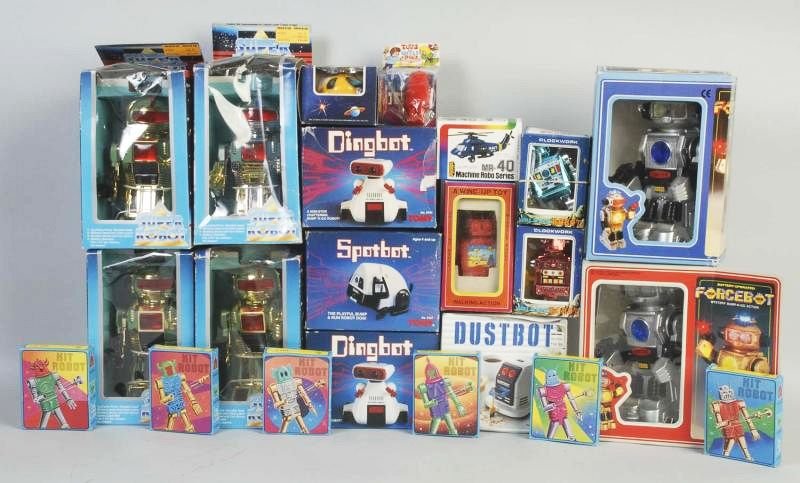 Lot of 19: Contemporary Robot & Space Toys.: All in original boxes or packaging. Includes several Tomy robots, a few more contemporary Chinese robots, and others. Boxes have creasing and wear. Some plastic bubbles are torn, but toys look unused.