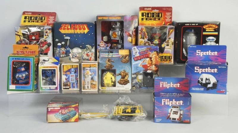 Lot of 14: Contemporary Robot & Space Toys.: All are either in original boxes or on cards. Some made in Korea, some marked "Hong Kong", and some made in Japan. Includes a few Tomy robots. Boxes have some creasing and tearing, but toys look unuse