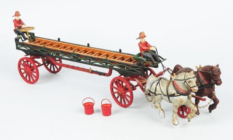 Cast Iron Horse Drawn Fire Ladder Truck.: Later casting. Appears to be all complete with buckets, ladders, and firemen drivers. All original. Condition (Excellent). Size 26" L.