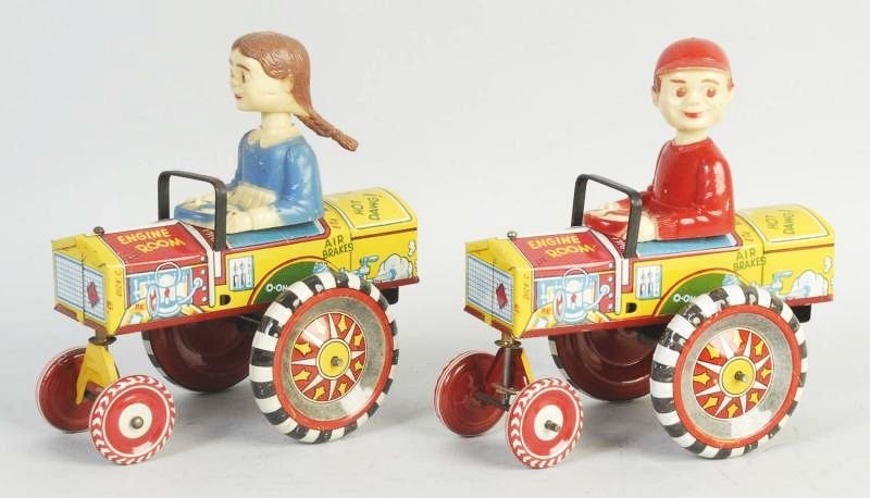 Lot of 2: Marx Tin Wind Up Dan & Dora Crazy Cars.: Both appear all original. Does have some scratching and wear throughout especially to wheels. Condition (Excellent). Size Each: 6" L.