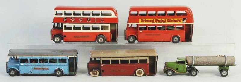 Lot of 5: Tri-Ang Minic Vehicles.: Includes two double decker buses, also two London Transport buses, and a log hauling truck. Toys appear all original. Some wear and scratching throughout. All are tin wind-ups. Condition (Good - Excel