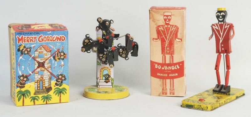 Lot of 2: Vintage Toys.: Including a tin wind-up mechanical Native merry-go-round. Comes with original box. Does have some slight scratching and wear. Second toy is a Bojangles dances again toy. Wooden dancer on tin platform.