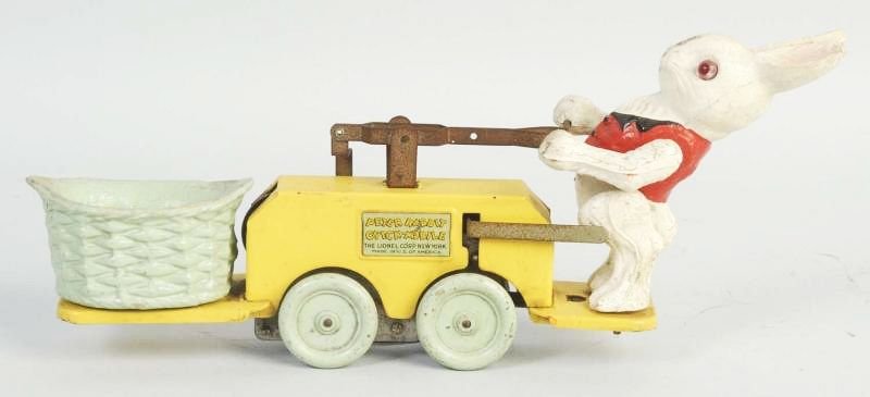 Lionel Peter Rabbit Toy Hand Car.: Scarcer floor version with disc wheels. Looks to have original eyes. Some chipping and wear to basket and oxidation to bare metal parts. Condition (Very Good). Size 10 - 1/2" L.