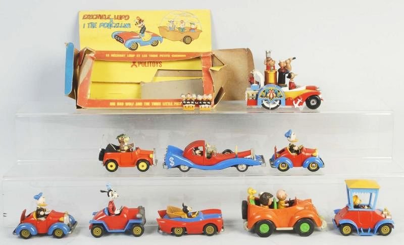 Lot of 9: Diecast Comic Character Vehicle Toys.: Includes a Corgi paddle-wagon, seven Italian toys made by Politoys, and one Charlie Brown car which is made by Aviva Toy Company. Circa 1960s and 70s. One has partial original box. Condition (Very Goo