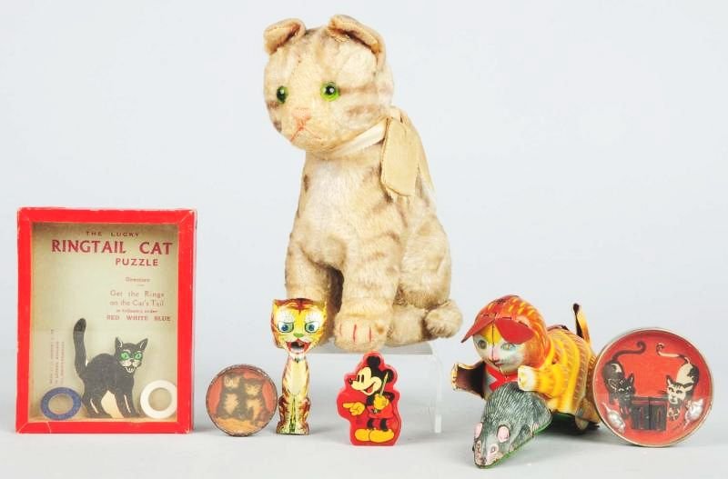 Lot of 7: Vintage Cat & Mouse Toys.: Includes a Walt Disney Mickey Mouse pencil sharpener, three cat-themed dexterity puzzles, a Japanese tin litho whistle, a Japanese wind-up cat with mouse and a steiff Susi cat with tag. Condition (Ver