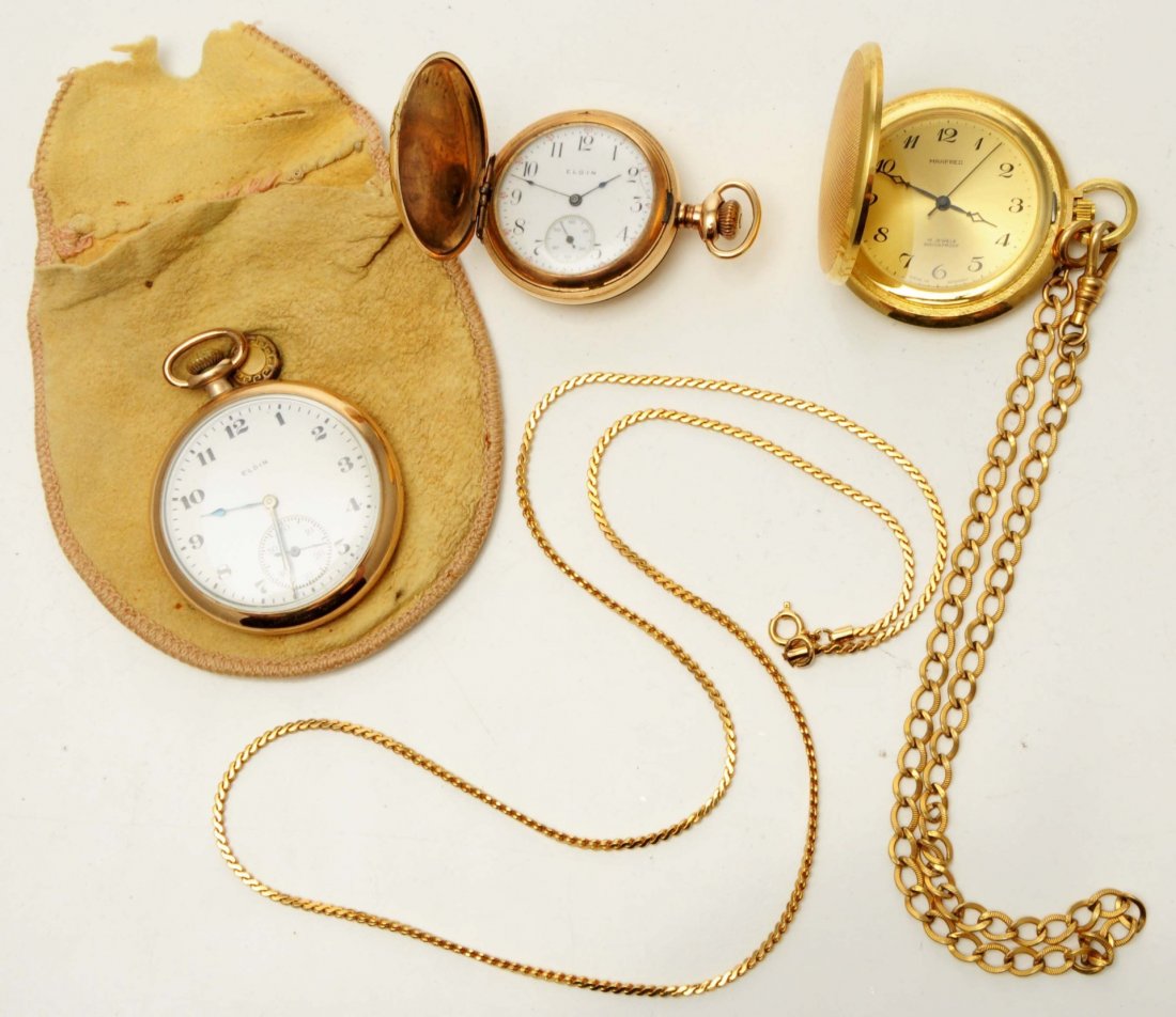 Lot of 3: Pocket Watches.: Includes one Manfred 17 Jewel German watch with chain, one Elgin 25 year hunting case with small diamonds and chain, and one Elgin 20 year case, open face watch. All are in working condition.