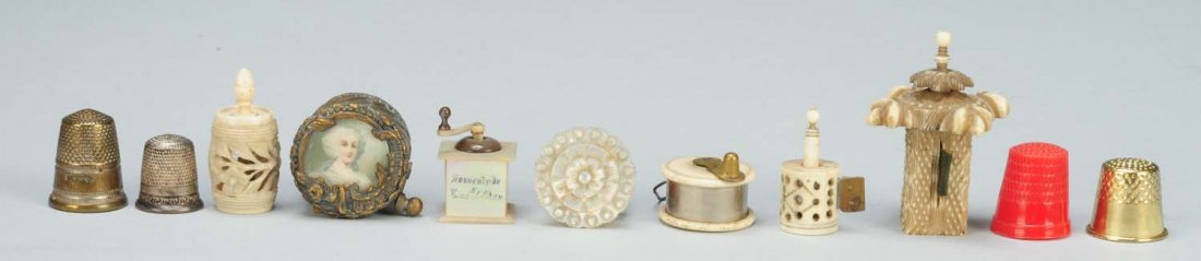 Lot of 11: Sewing Tools & Tape Measures.: Seven figural tape measures. Four thimbles. Condition (Excellent). Size Largest: 2" T.