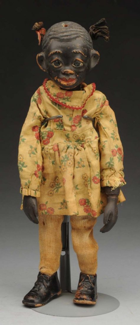 Effanbee Co. Black Girl Doll.: Girl has pigtails. Original outfit. Signed on neck "Lucifer V. Austin". Circa 1915. Condition (Very Good). Size 13 -1/2" T.