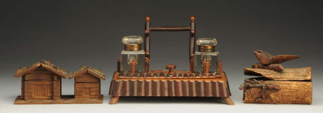 3 Wooden Inkwells.: One is a large wood with two walls and four slots for standing. Second is a bird on nest with eggs and log. Last is two stoves. Condition (Excellent). Size Largest: 8 - 1/2" L.