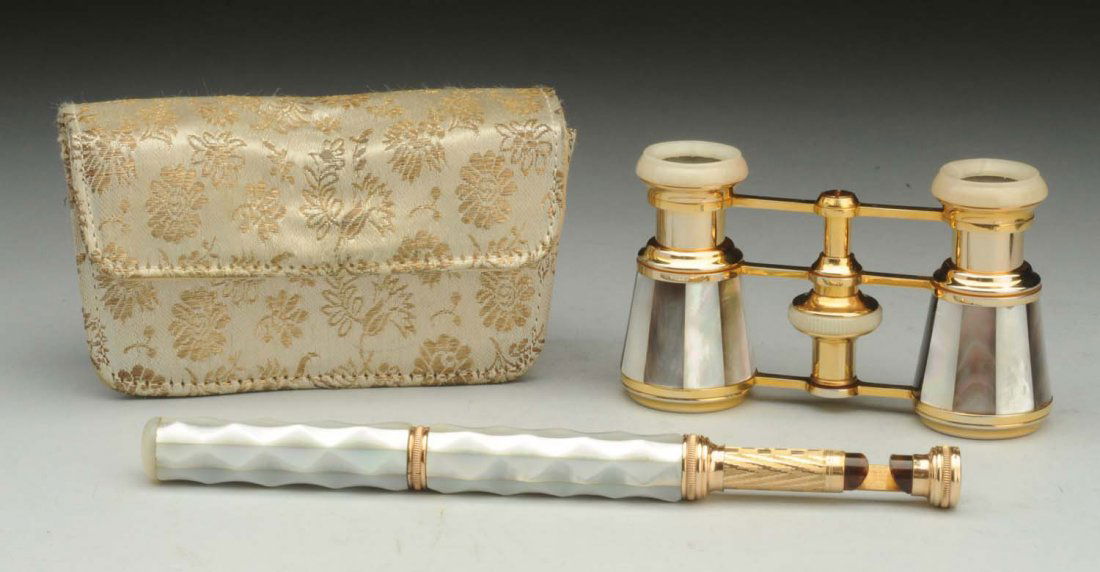 MOP Opera Glasses.: Mother of pearl open glasses with mop handles circa 1930. In "Like New" condition. Condition (Excellent). Size Largest Box: 8" L.