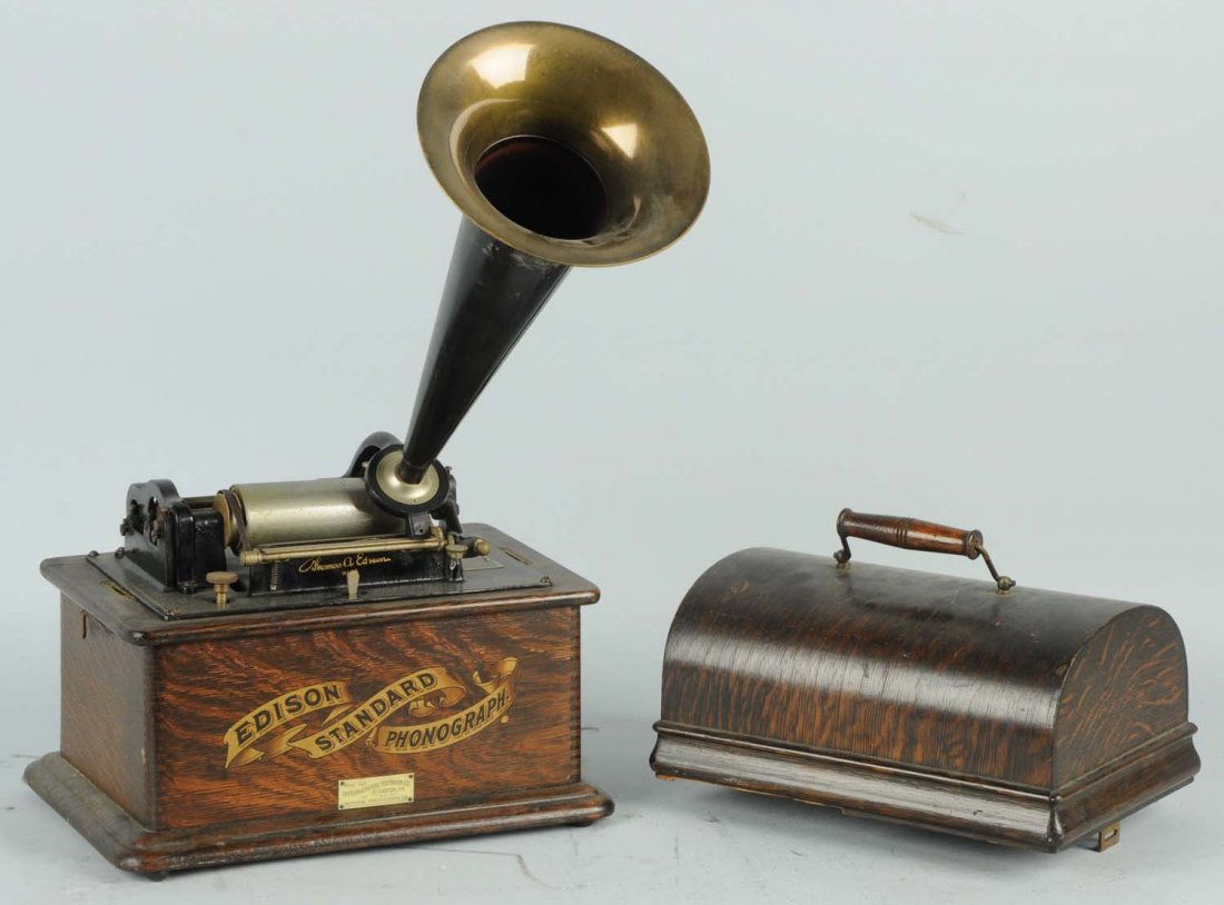 Edison Phonograph with Horn.: Appears complete. Works. Bell broken. Condition (Excellent). Size 13" L.