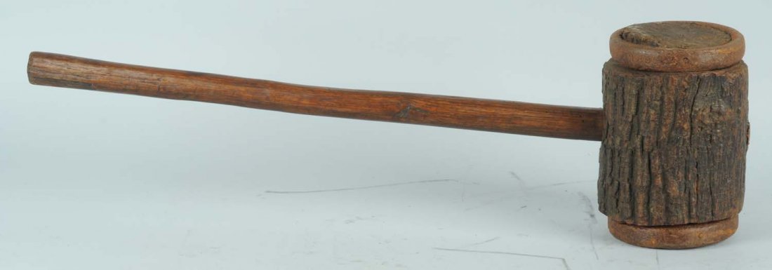 Early Metal & Wood Ringling Bro's Circus Mallet.: Ringling Bros. Grommet metal ring. Handle is made of wood. Probably used to hammer in tent pegs. Definitely shows use. Some oxidation to metal rings. Condition (Very Good). Size 31" L.