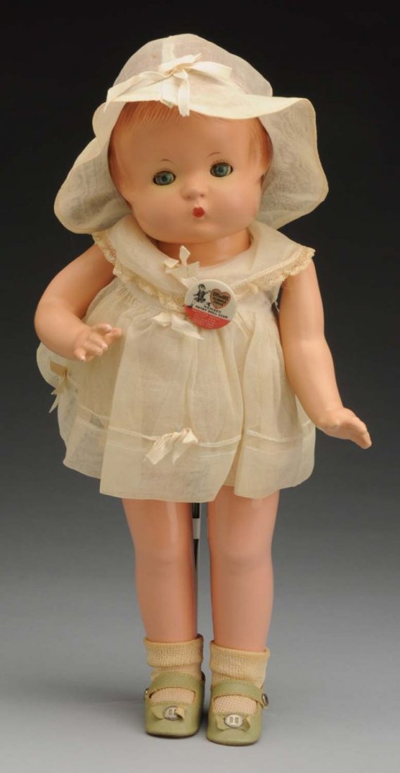 Original Effanbee “Patsy” Doll.: All composition with molded red hair, lashed sleeping eyes tiny closed mouth; factory original organdy dress and matching hat, undies, shoes and socks, Patsy club pin. (some discoloration around eyes,
