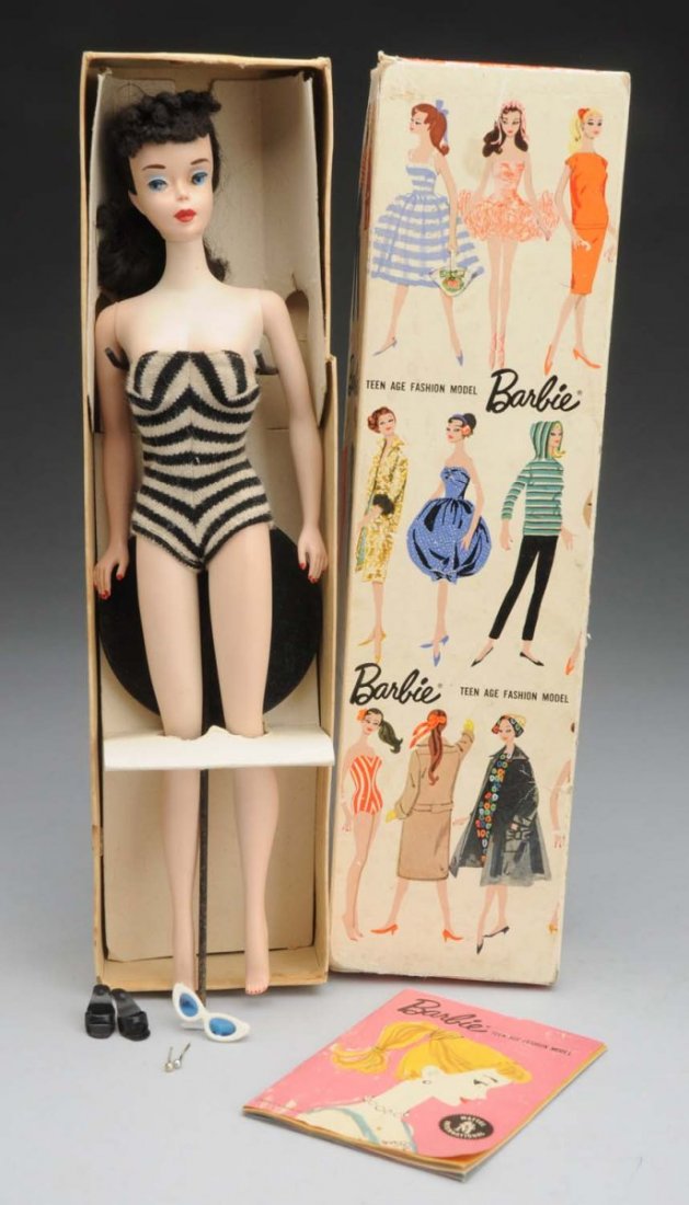 Brunette No.3 Barbie Doll.: With box. This is a great No.3 Barbie has brunette hair and unusual blue eyeliner. She has no greening at the ears nd no splits to the vinyl. Her lip, eye and nail polish color is fantastic. She has f