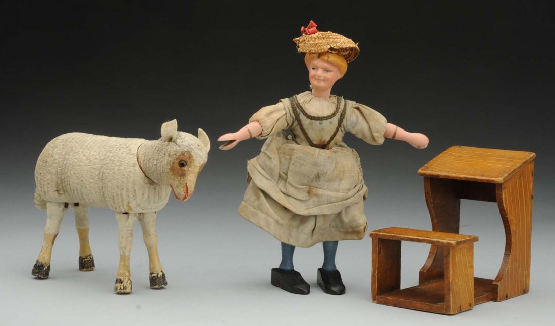 Rare Schoenhut “Mary Had a Little Lamb” Set.: Mary has molded head with painted features (light crazing on face, some paint loss of back of hair), wood body, original dress (some soil) and straw hat (hat needs repair), wood lamb with glass eyes a