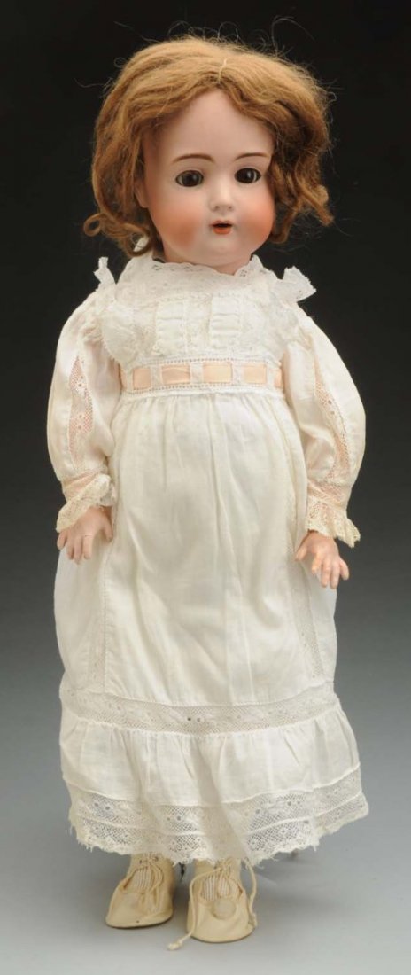 Unusual BSW Child Doll.: German bisque socket head incised BSW in heart made by Bruno Schmidt with multistroked eyebrows, sleeping eyes with some real upper lashes (eye lid wax cracked on one lid), painted lower lashes, open