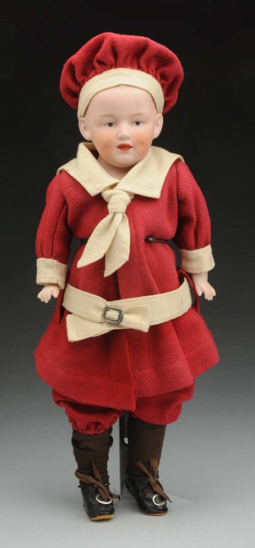 Smiling Heubach Character Boy.: German bisque shoulder head with Gebr. Heubach sunburst mark and Germany, molded blonde hair, tapered blonde eyebrows, intaglio eyes with black eyelid line, open/closed mouth with molded tongue, dimpl