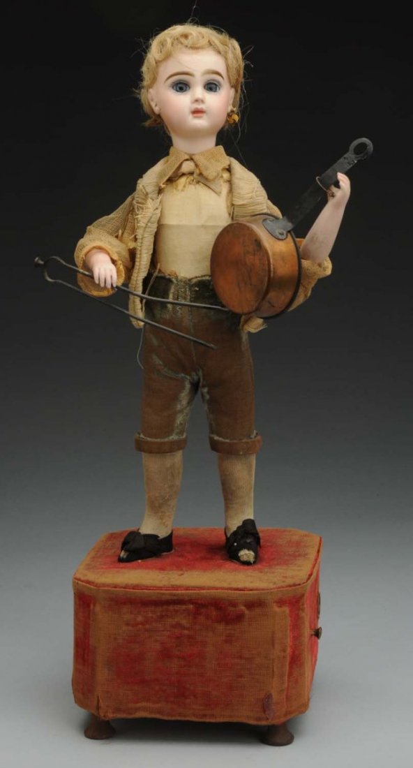Delightful French Jumeau Mechanical Doll.: . Jumeau bisque socket head fully marked with Jumeau red stamp (some speckling), multistroked eyebrows, inset paperweight eyes, painted upper and lower lashes, closed mouth, human hair curls; original